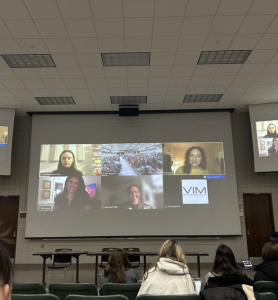 A presentation on a big screen at a meeting