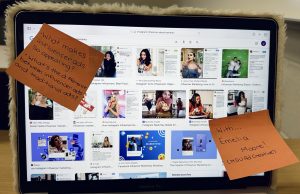 A computer screen with post-it notes.