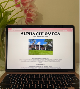 A website appears on a laptop screen