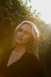 A portrait of a person with artistic lighting