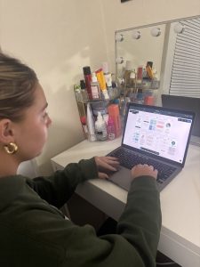 A woman works at a laptopcomputer
