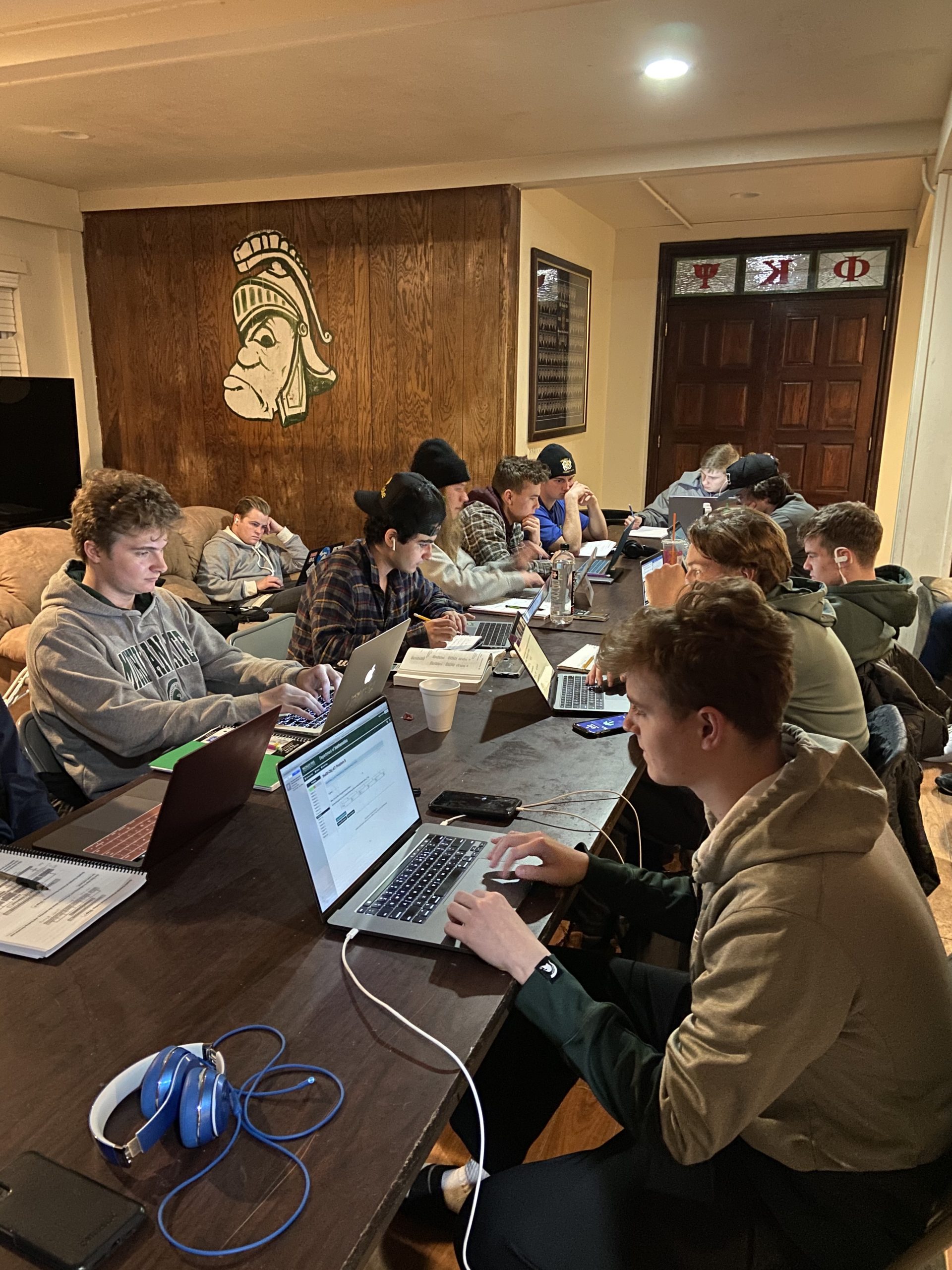 Group of men in computer lab