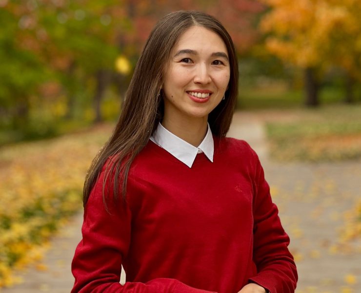 Portrait of a graduate student outside