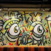 A hip-hop art-inspired mural inside a restaurant