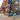 An exterior shot of a colorful mural on a street corner