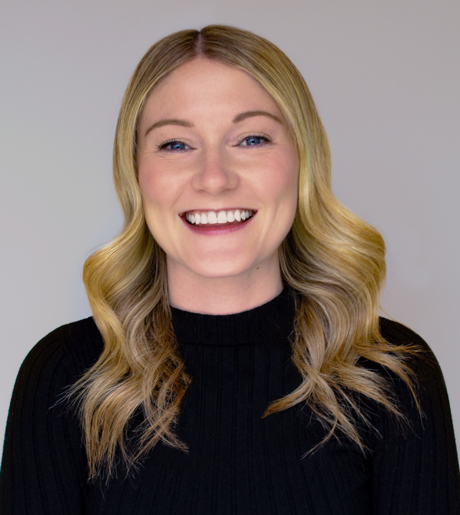 Portrait of a smiling person.