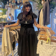 A person poses in a store