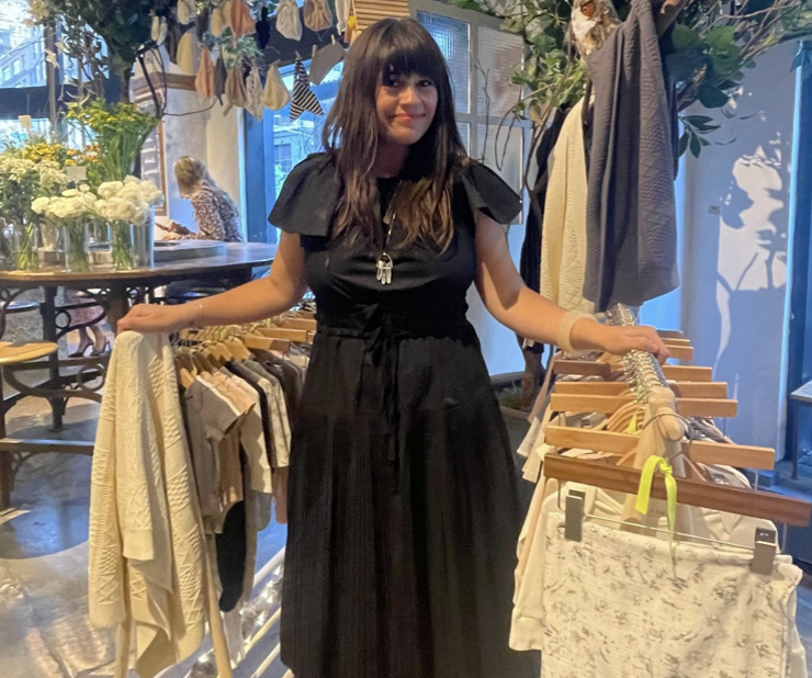 A person poses in a store