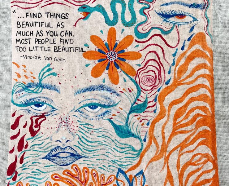 Handwritten, handcolored designs on a piece of paper