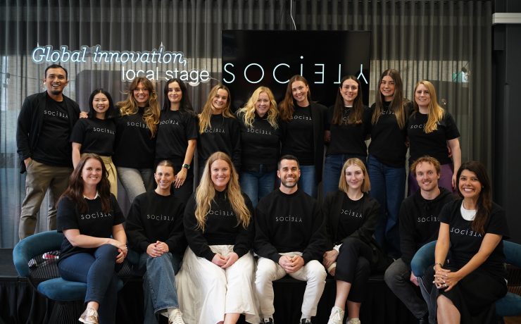 A group of people smiling