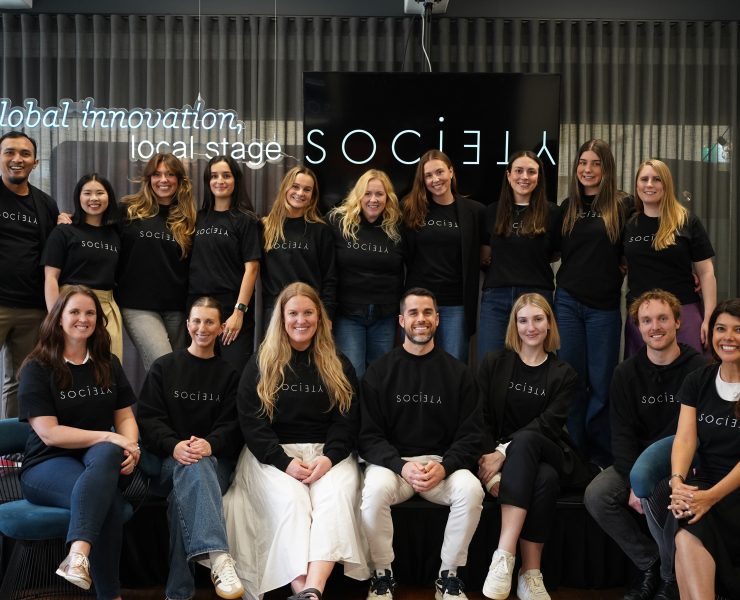 A group of people smiling