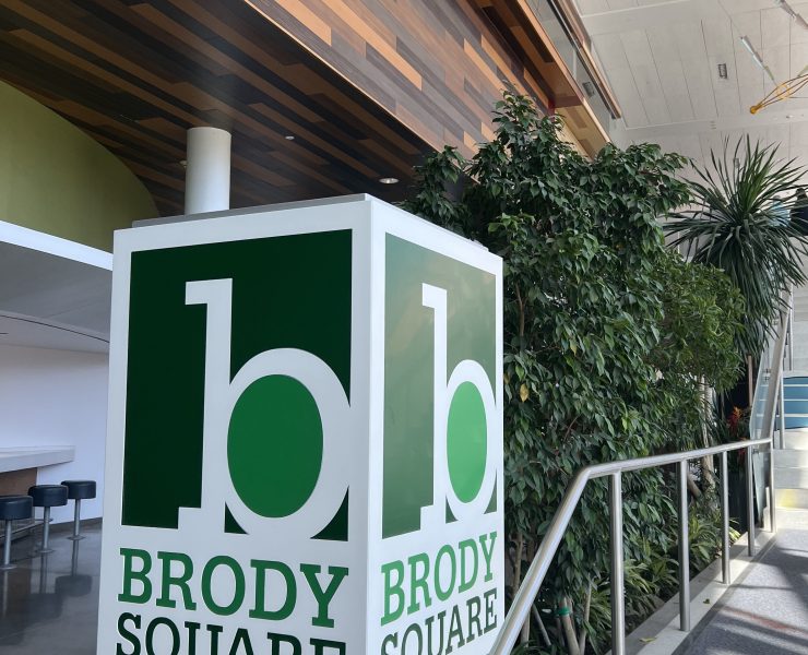 The Brody Square logo next to steps that lead to Brody Square