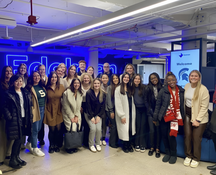 A group of people posing for a photograph