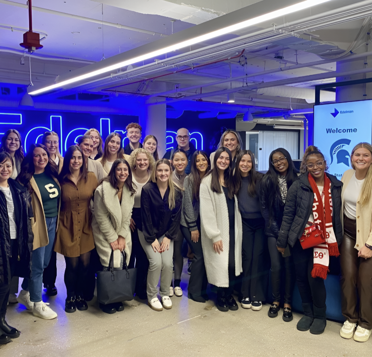 A group of people posing for a photograph