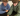 Two people look at a phone screen together