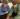 Two people look at a phone screen together