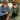 Two people look at a phone screen together