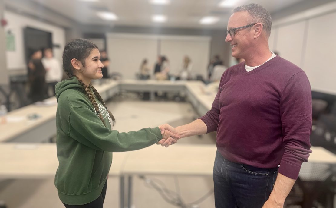 Two people shaking hands