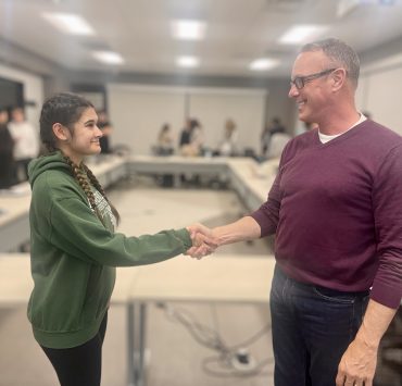 Two people shaking hands