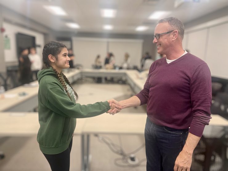 Two people shaking hands