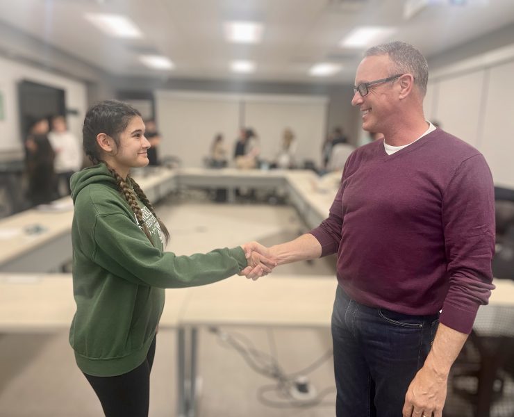 Two people shaking hands