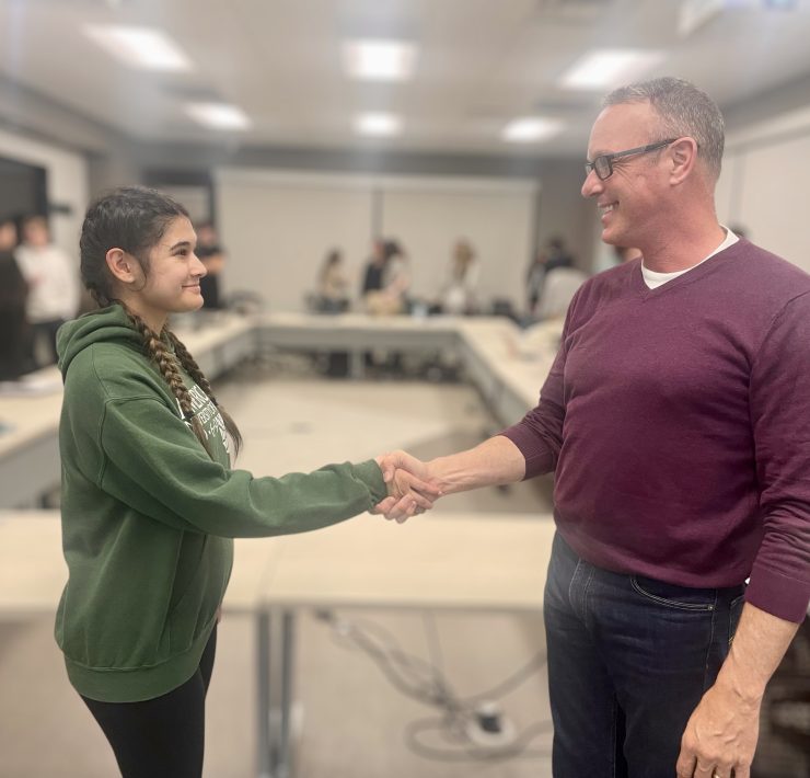 Two people shaking hands