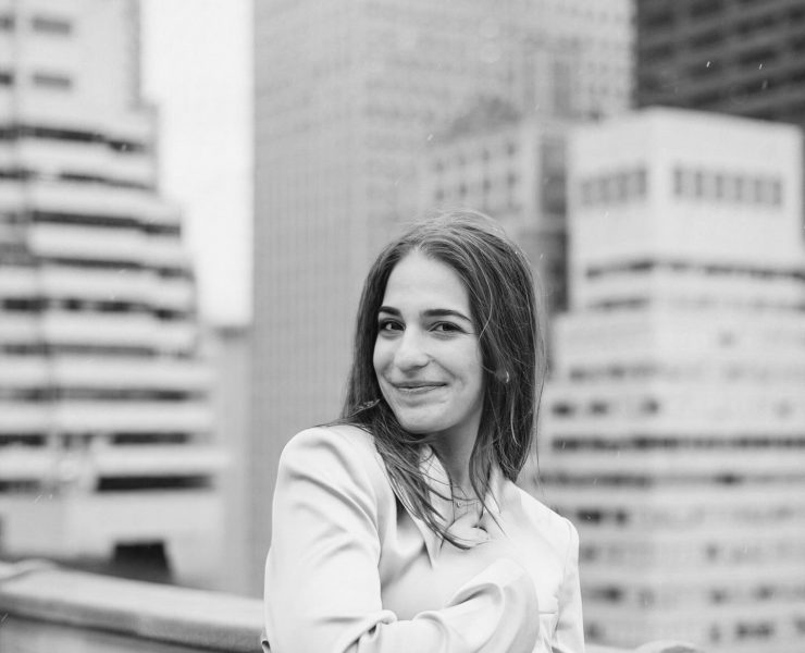 A portrait of a person outside