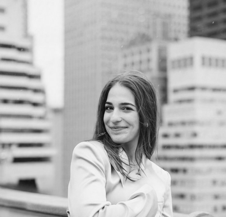 A portrait of a person outside