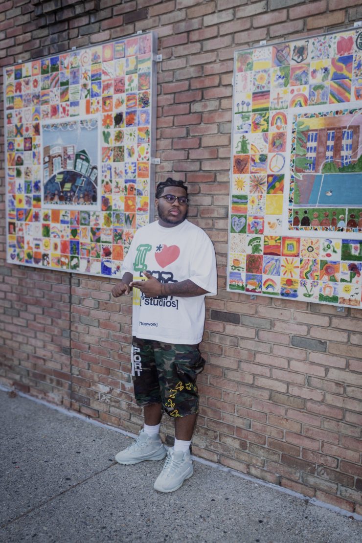 A person posing outside