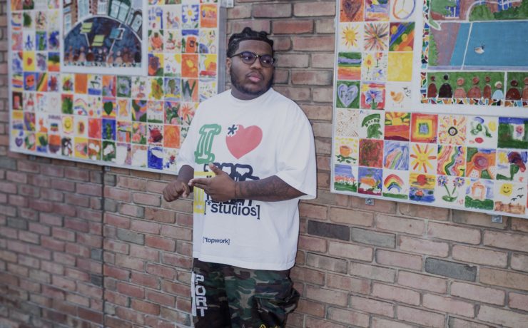 A person posing outside