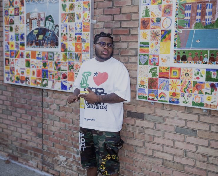 A person posing outside