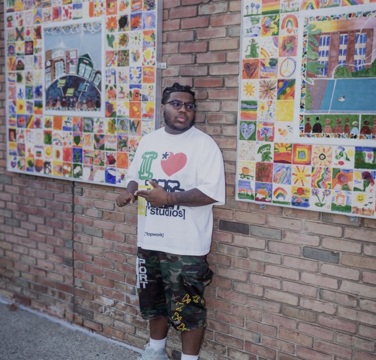 A person posing outside