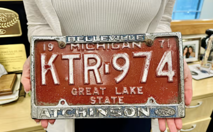 an old red orange license plate