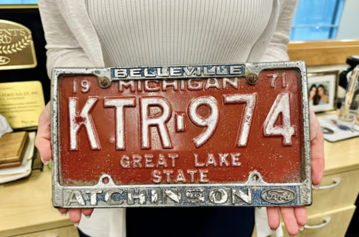 an old red orange license plate