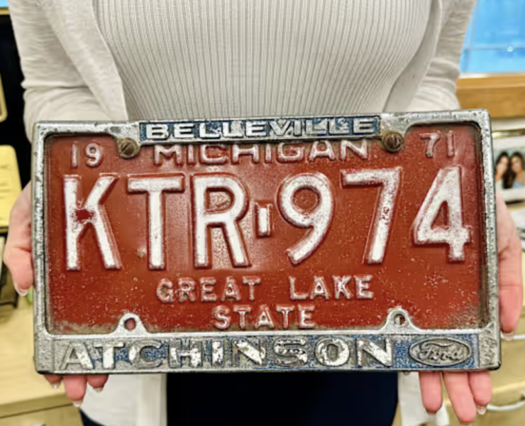 an old red orange license plate
