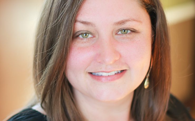 A portrait of a smiling faculty member