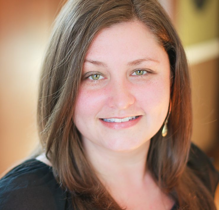 A portrait of a smiling faculty member